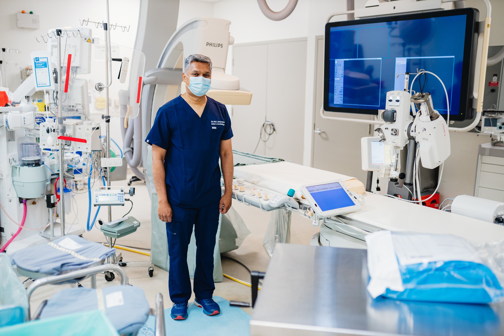 HHS doctor surrounded by medical equipment